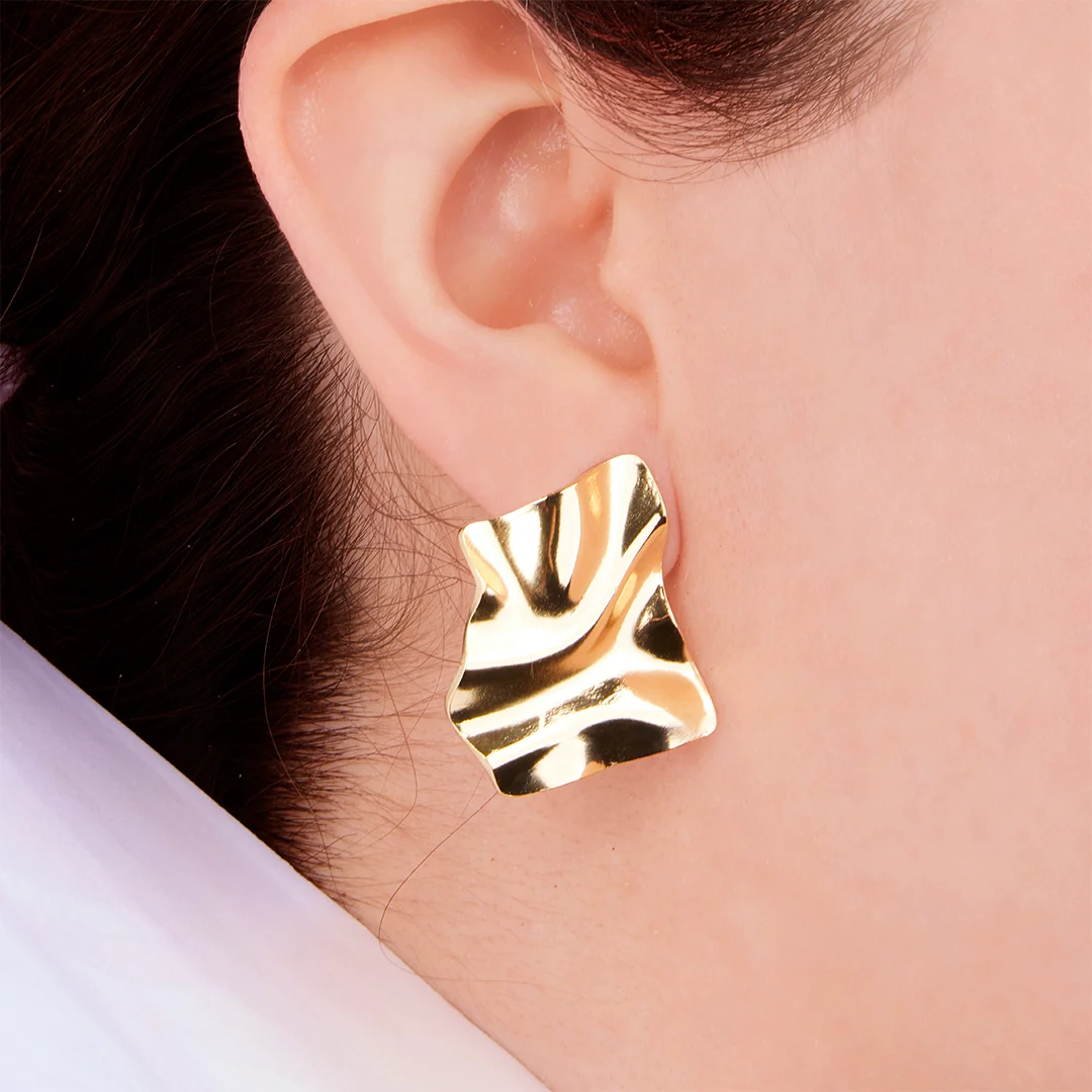 ARETES CUADRADOS TEXTURIZADOS ACERO DORADO 94047